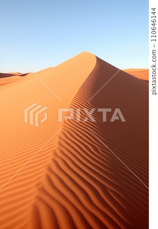 sand wave is blown from one spot in the dunes of namibia sand 110646144