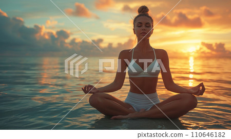 beautiful couple making yoga in summer garden 110646182