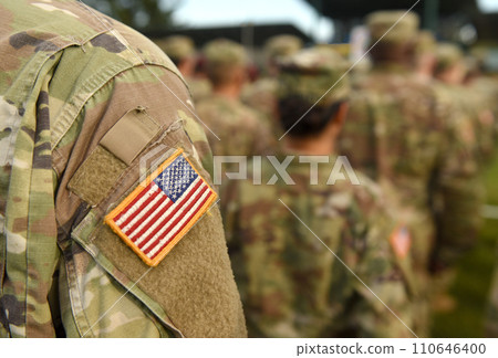 American Soldiers and Flag of USA on soldiers arm. US Army. Veteran Day American Soldiers and Flag of USA on soldiers arm. US Army. Veteran Day 110646400