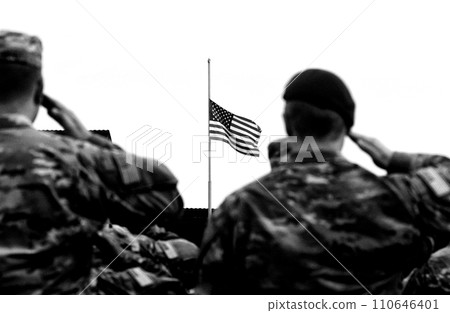 American Soldiers Saluting US Flag. US Army. US troops. Military of USA. Veterans Day American Soldiers Saluting US Flag. US Army. US troops. Military of USA. Veterans Day 110646401