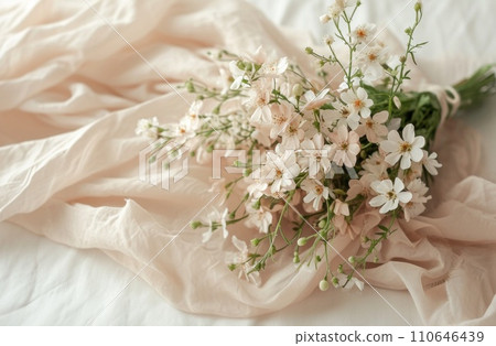 small flower bouquet and wrapping paper with flowers on white background isolated on white, 110646439