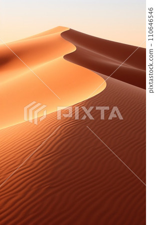 sand wave is blown from one spot in the dunes of namibia sand 110646546