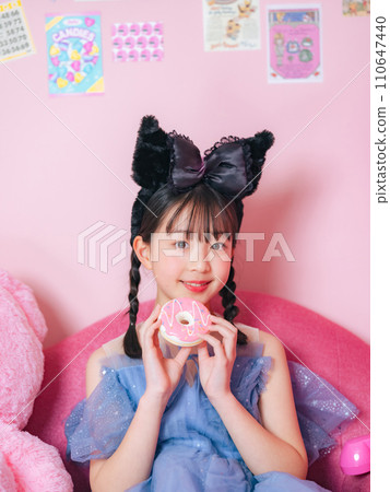 Portrait of a girl taken in a pink room Portrait of a girl taken in a pink room 110647440