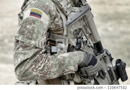 Soldier with assault rifle and flag of Colombia on military uniform. Collage. 110647582