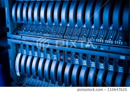 Row of hard disks used for data storage in internet data center 110647620