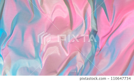 Pastel color transparent silk fabric flowing by wind, close-up 110647734