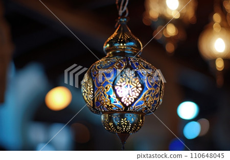 an old traditional lamp lit amidst beautiful bokeh an old traditional lamp lit amidst beautiful bokeh 110648045