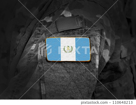 Flag of Guatemala on military uniform. Army, troops, soldier (collage). 110648213