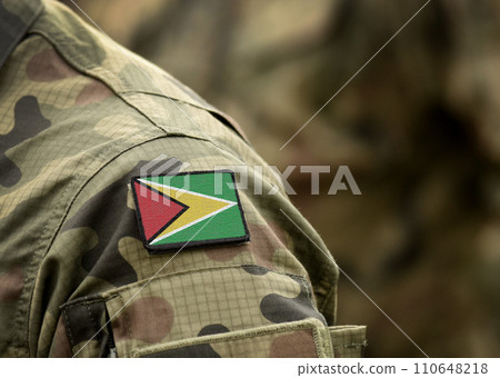Flag of Guyana on on military uniform. Army, troops, soldier (collage). Flag of Guyana on on military uniform. Army, troops, soldier (collage). 110648218