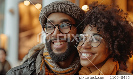 Couple celebrating milestones, their affection evident in warm, tight embraces 110648455