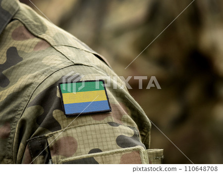 Flag of Gabon on military uniform. Army, troops, soldiers, Africa,(collage). 110648708