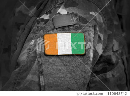 Flag of Ivory Coast or Cote d'Ivoire on military uniform. Army, troops, soldiers, Africa, (collage). 110648742