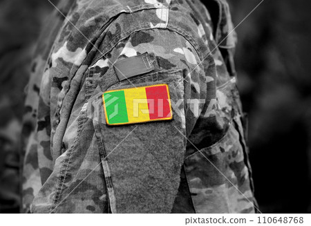 Flag of Mali on military uniform. Army, troops, soldiers. Collage. Flag of Mali on military uniform. Army, troops, soldiers. Collage. 110648768