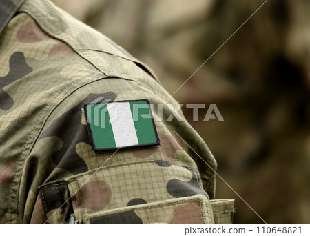 Flag of Nigeria on military uniform. Army, soldiers, Africa (collage). Flag of Nigeria on military uniform. Army, soldiers, Africa (collage). 110648821