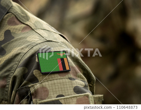 Flag of Zambia on military uniform. Army, troops, soldiers, Africa (collage). 110648873