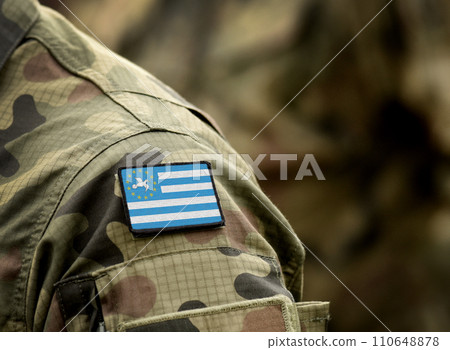 Flag of Ambazonia, also known as Amba Landon military uniform. Army, armed forces, soldiers. Collage. Flag of Ambazonia, also known as Amba Landon military uniform. Army, armed forces, soldiers. Collage. 110648878