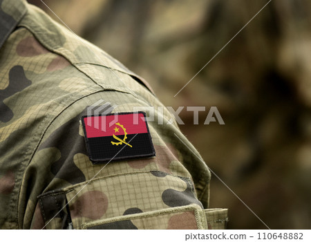 Flag of Angola on military uniform. Army, troops, soldiers, Africa,(collage). 110648882
