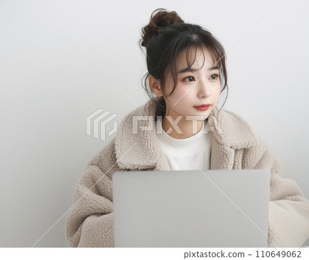 Young woman working from home (AI generated image) 110649062