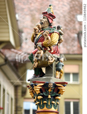 Famous fountain and statue of ogre eating small children in Berne, Switzerland Famous fountain and statue of ogre eating small children in Berne, Switzerland 110649462