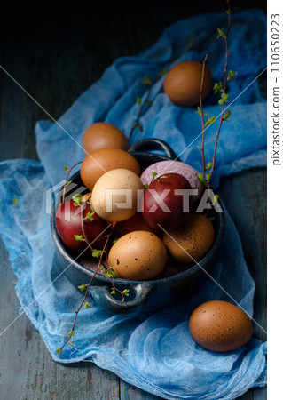 Still life with eggs and flowers 110650223