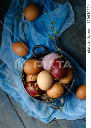 Still life with eggs and flowers 110650224