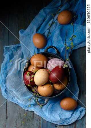 Still life with eggs and flowers 110650225