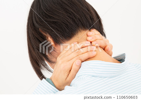 Middle woman suffering from neck pain Middle woman suffering from neck pain 110650603