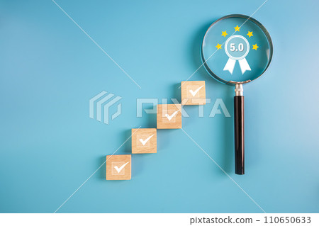 Businessman mark checklist for best quality score, product warranty, ISO standard and quality assurance concept. 110650633