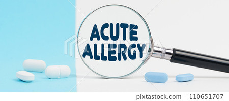 On a black table is a stethoscope and a notebook in which the man wrote - ACUTE ALLERGY On a black table is a stethoscope and a notebook in which the man wrote - ACUTE ALLERGY 110651707