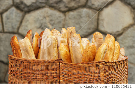 Selling bread at the bakery stand at the farmers street market. 110655431