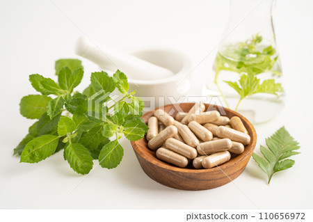 Alternative medicine herbal organic capsule with vitamin E omega 3 fish oil, mineral, drug with herbs leaf natural supplements for healthy good life. 110656972