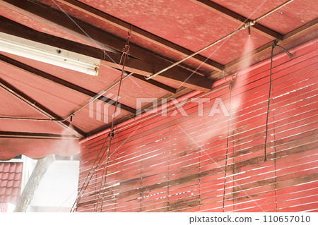 Eco system with nozzle spraying water mist to cool down the very warm ambient temperature at corridor Eco system with nozzle spraying water mist to cool down the very warm ambient temperature at corridor 110657010