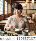 A scene where a slightly chubby middle-aged woman who loves Japanese food is eating. 110657137