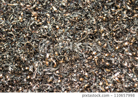 Close-up scene of  the metal materials scrap from turning process. 110657998