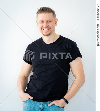 Happy man wearing black shirt with copy space 110658376