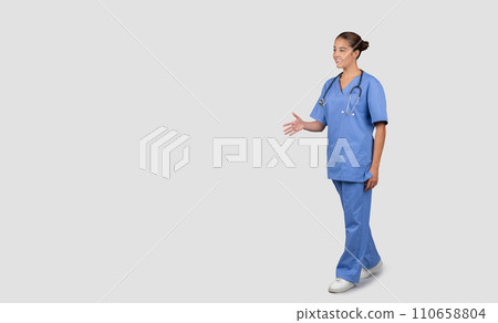 Positive friendly millennial caucasian woman nurse with stethoscope Positive friendly millennial caucasian woman nurse with stethoscope 110658804