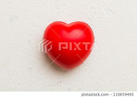 red heart shape on colored background. minimal concept top view with copy space red heart shape on colored background. minimal concept top view with copy space 110659495