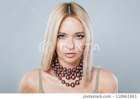 Glamorous fashion model woman with clear fresh perfect skin and long blonde hair Glamorous fashion model woman with clear fresh perfect skin and long blonde hair 110661863