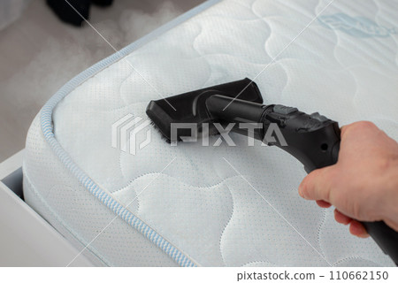 Clean a Mattress with a Steam Cleaner 110662150