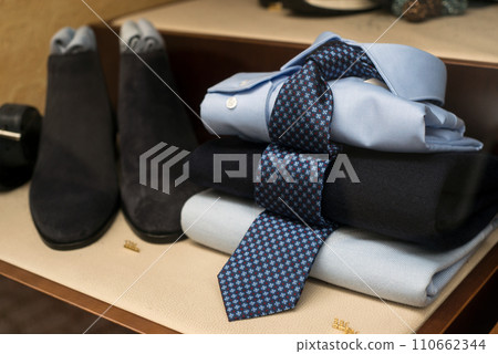 closeup of tie and men shirt in a fashion store showroom 110662344