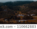 Secluded Mountain Village A Cozy Hamlet Nestled Amongst the Golden Hues of Fall. 110662883