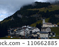 Mountain Sanctuary: A Village Against the Forested Hillside, Shrouded in Mist 110662885