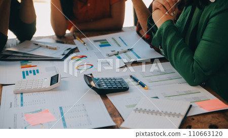 Serious mature caucasian male ceo executive manager with male business partner discussing corporation merge plan at board room table. Professional coworkers leaders doing paperwork in modern office. 110663120