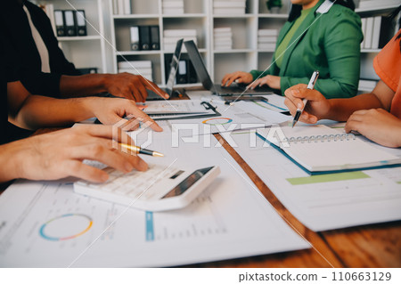 Male mature caucasian ceo businessman leader with diverse coworkers team, executive managers group at meeting. Multicultural professional businesspeople working together on research plan in boardroom. Male mature caucasian ceo businessman leader with diverse coworkers team, executive managers group at meeting. Multicultural professional businesspeople working together on research plan in boardroom. 110663129