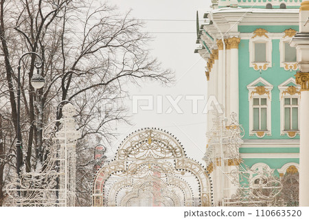 Christmas decoration of festive building of the Hermitage on square Palace in Russia - Saint Petersburg at snowfall Christmas decoration of festive building of the Hermitage on square Palace in Russia - Saint Petersburg at snowfall 110663520