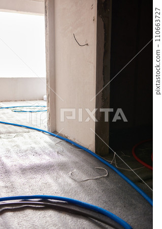 Sheet of expanded polystyrene on the concrete floor for house thermal insulation during constructions 110663727