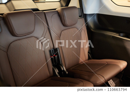 Car inside. Interior of prestige modern car. Comfortable leather seats Car inside. Interior of prestige modern car. Comfortable leather seats 110663794