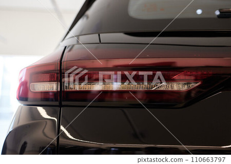 Close up of rear taillight on a vehicle. Close up of rear taillight on a vehicle. 110663797