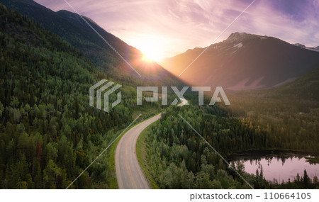 Scenic road in the valley surrounded by the Canadian Mountains. Aerial. Scenic road in the valley surrounded by the Canadian Mountains. Aerial. 110664105