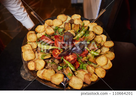 Saj - traditional Azerbaijan food. Lamb saj 110664201